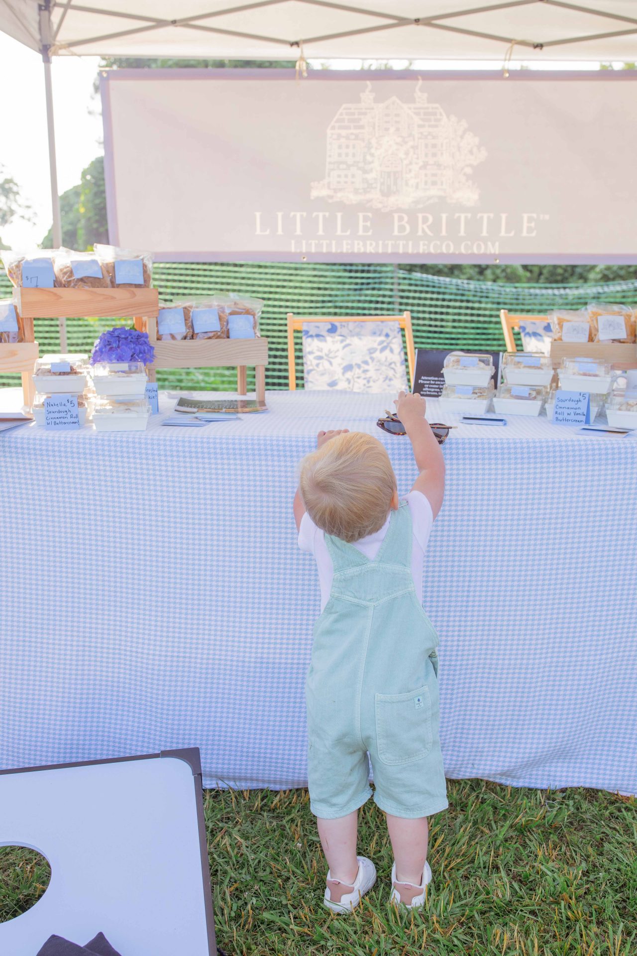 starting a business, little brittle llc, little brittle peanut brittle, little brittle, taralynn, owner of little brittle, moms starting businesses, how to start a business, my first farmers market, farmers market fort mill South Carolina, working, bakery, peanut brittle company, brittle company, the best brittle ever, maple cinnamon pecan brittle, marketing, business branding, cottage, business aesthetic, South Carolina business, South Carolina farmers market, town of fort mill, fort mill south Carolina, sourdough cinnamon rolls, commercial kitchen, best brittle in South Carolina, starting a business as a mom 