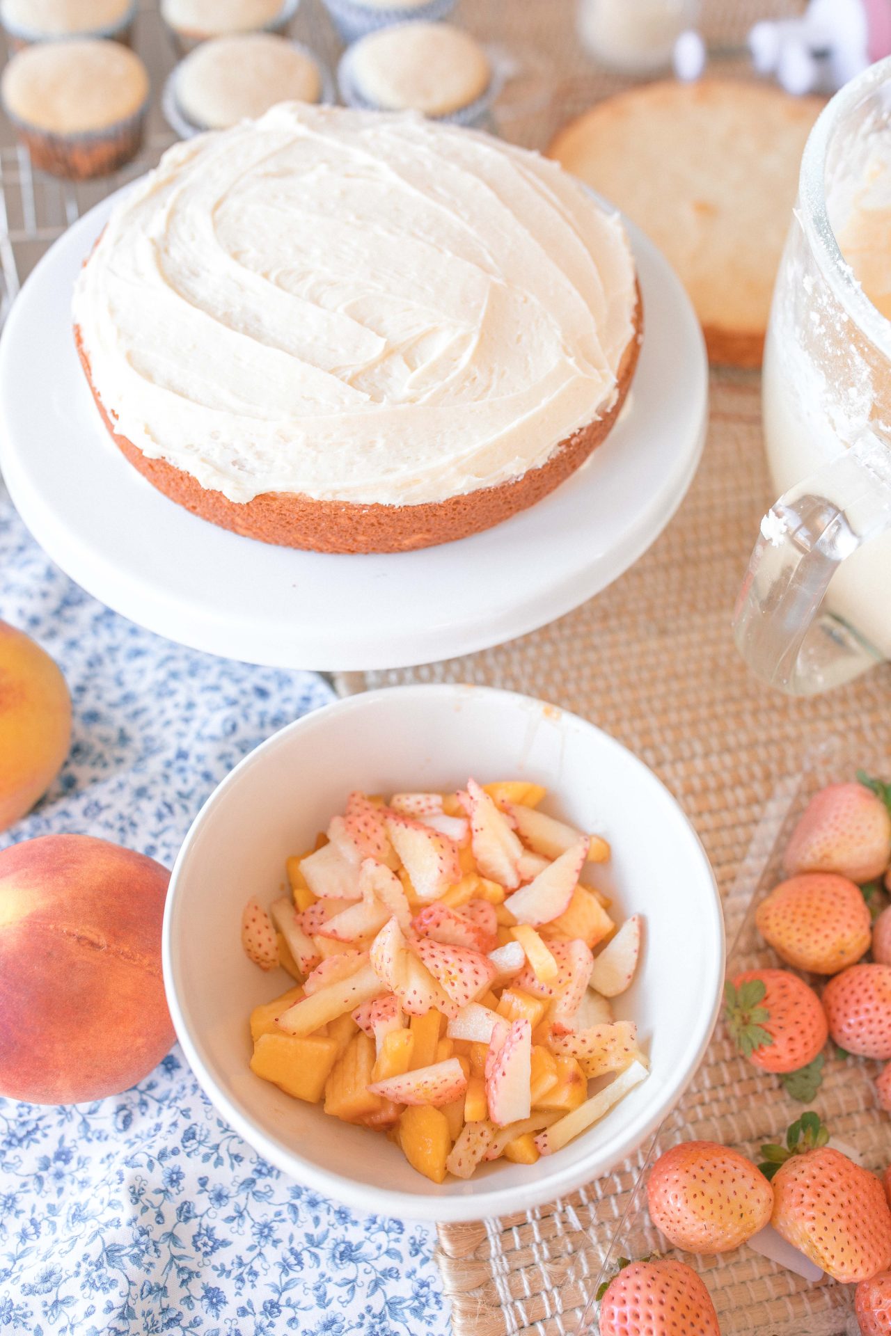 cake, almond cake, wedding cake, pineberries, pineberry recipe, what to make with pineberries, strawberries, peach cake, almond wedding cake, almond buttercream, easy cake recipe, amazing cake, dessert, spring cake, fruit cake, layered almond buttercream cake, the best cake flavors, how to make a layered cake