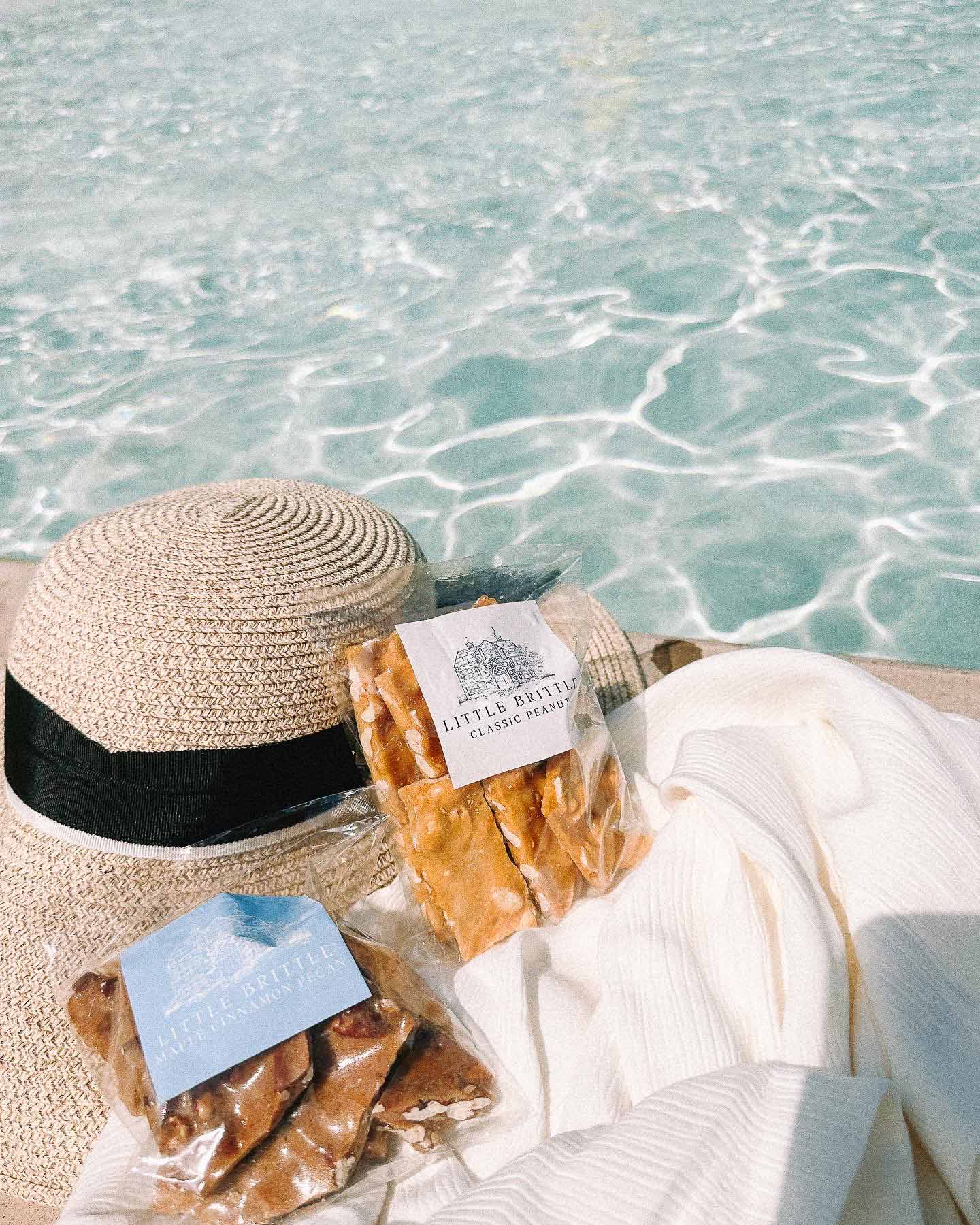 starting a business, little brittle llc, little brittle peanut brittle, little brittle, taralynn, owner of little brittle, moms starting businesses, how to start a business, my first farmers market, farmers market fort mill South Carolina, working, bakery, peanut brittle company, brittle company, the best brittle ever, maple cinnamon pecan brittle, marketing, business branding, cottage, business aesthetic, South Carolina business, South Carolina farmers market, town of fort mill, fort mill south Carolina, sourdough cinnamon rolls, commercial kitchen, best brittle in South Carolina, starting a business as a mom 